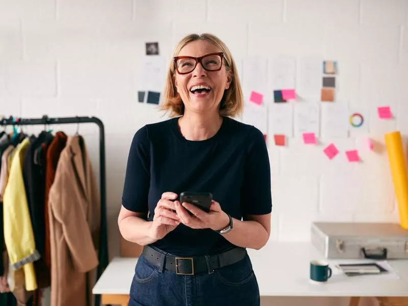 Woman laughing on phone