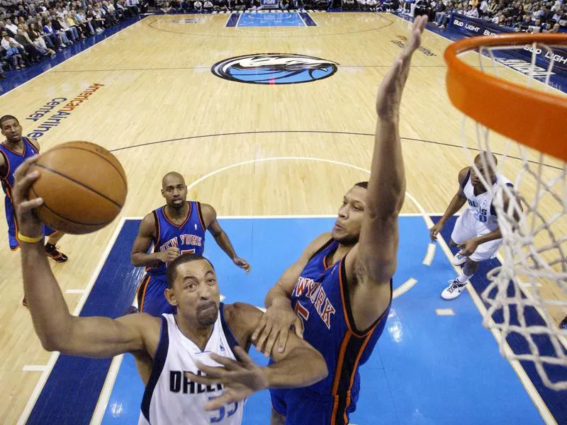 Dallas Mavericks forward Juwan Howard goes up for shot