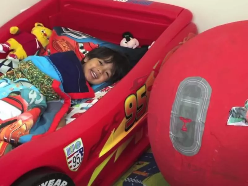 Ryan In Lightning McQueen bed