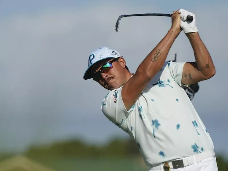 Rickie Fowler watches tee shot