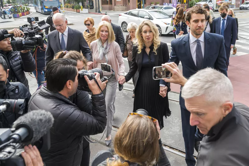 Elizabeth Holmes, Billy Evans and her parents