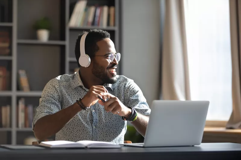 Guy smiling with headphones