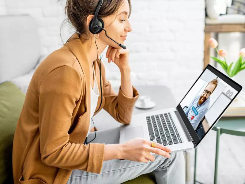 Business woman having a video call with coworker