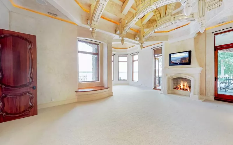 Master bedroom with decorative ceiling