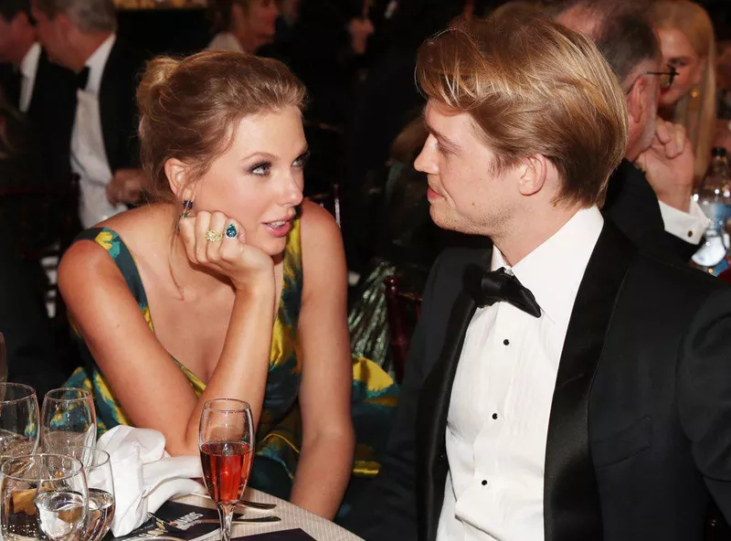 Taylor Swift and Joe Alwyn looking at each other