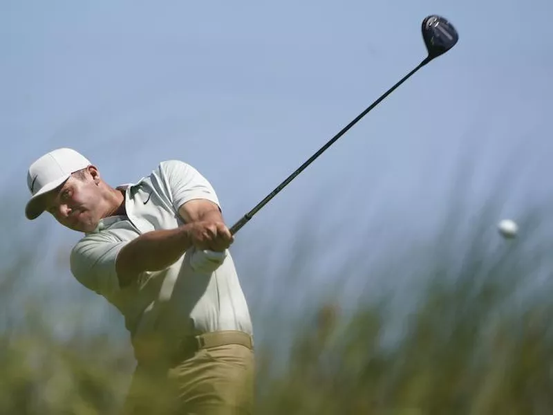 Paul Casey watches tee shot