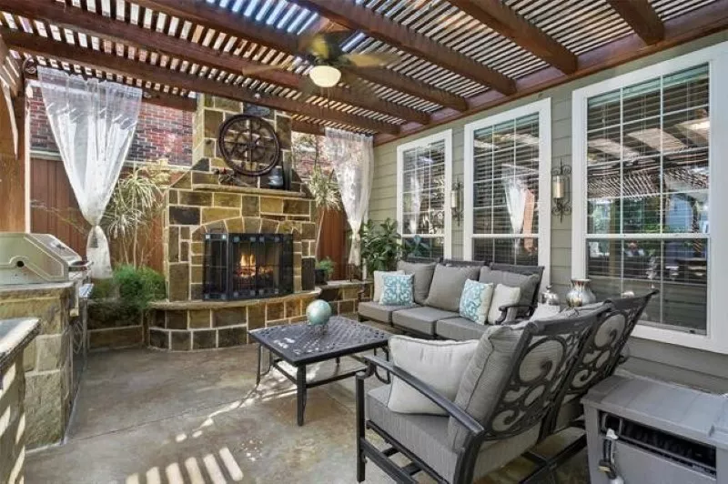 Outdoor fireplace with pergola