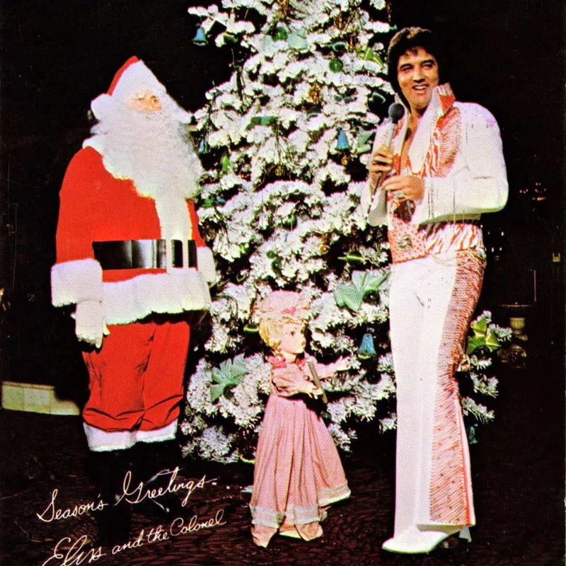 Colonel Tom Parker dressed as Santa