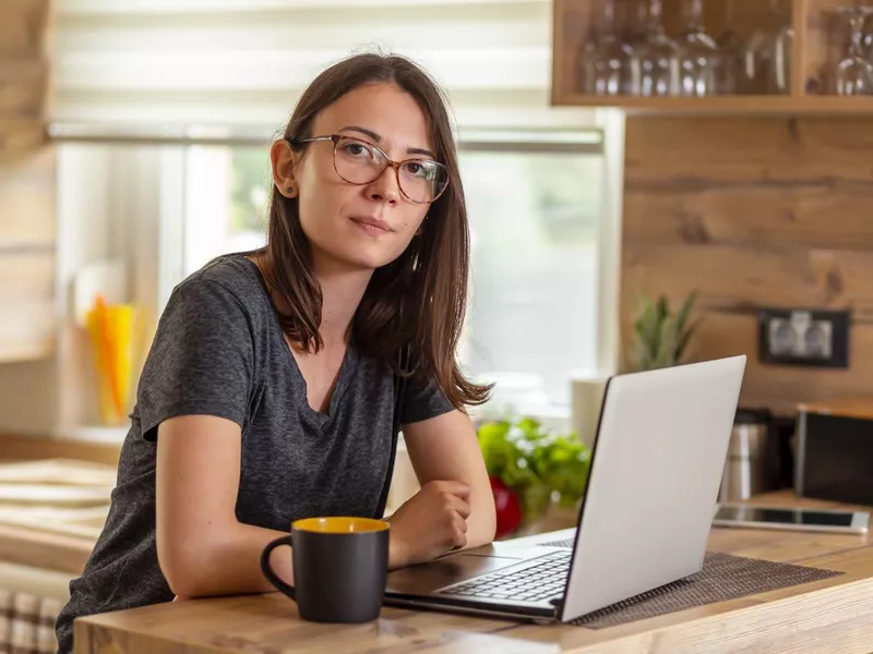 Technical support worker at laptop