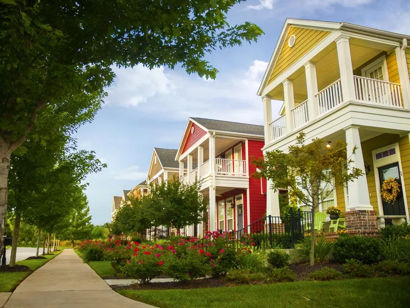 Row of colorful garden homes in suburban area