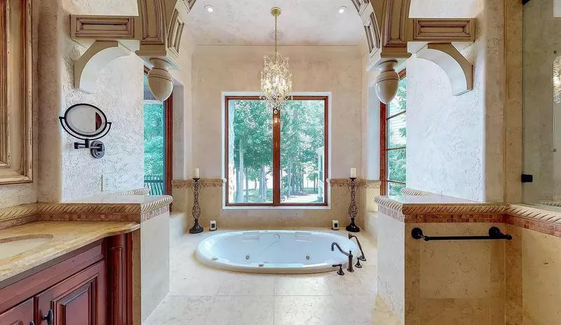 Master bathroom with sunken hot tub