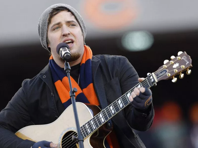 Lee DeWyze singing at halftime show