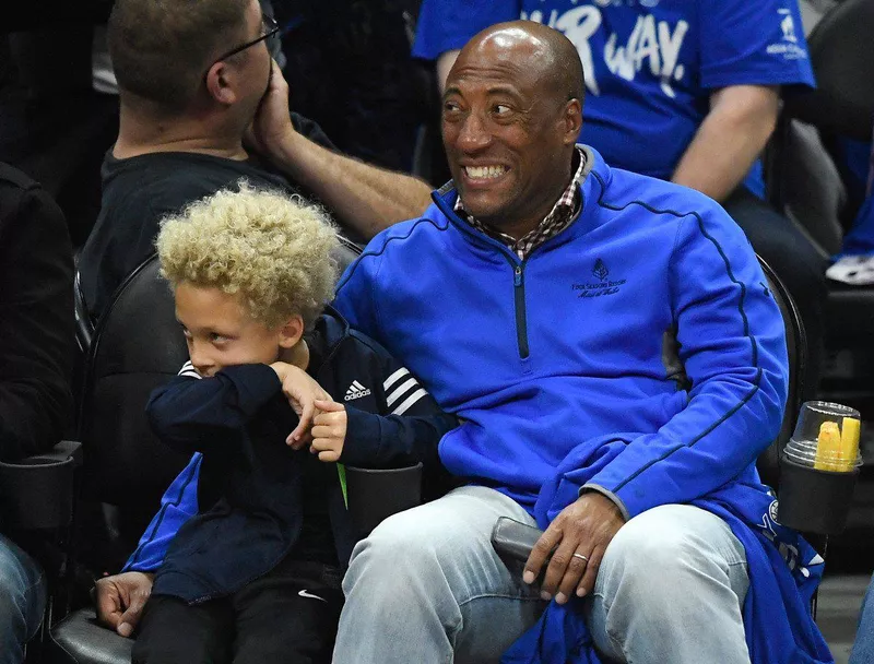 Allen with son at a game