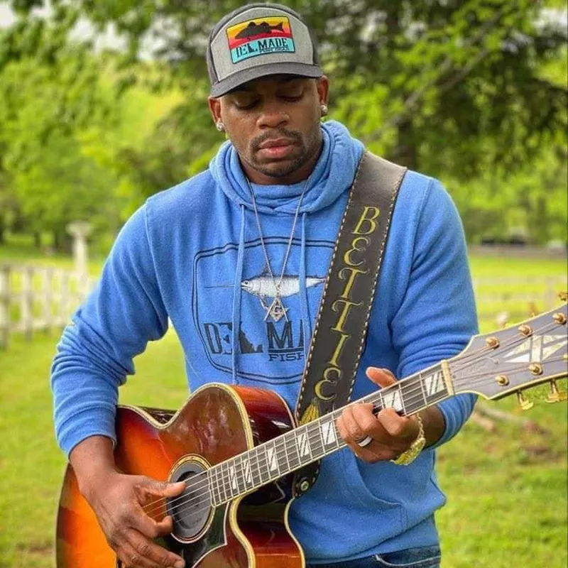 Jimmie Allen with guitar