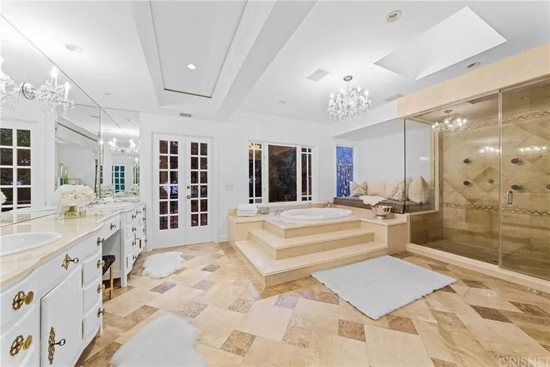 Large bathroom with vanity and garden tub